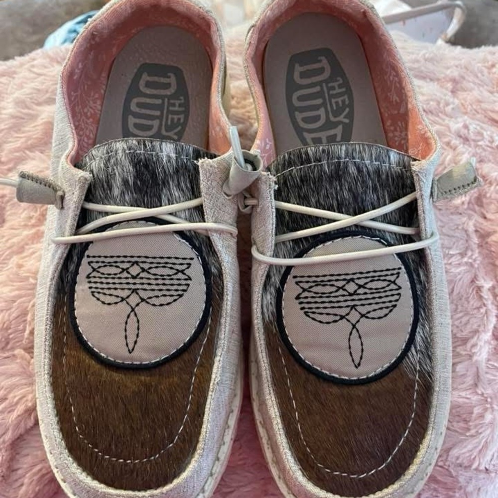 Hey Dude Slip-On Shoes with cowhide and boot stitch patch.